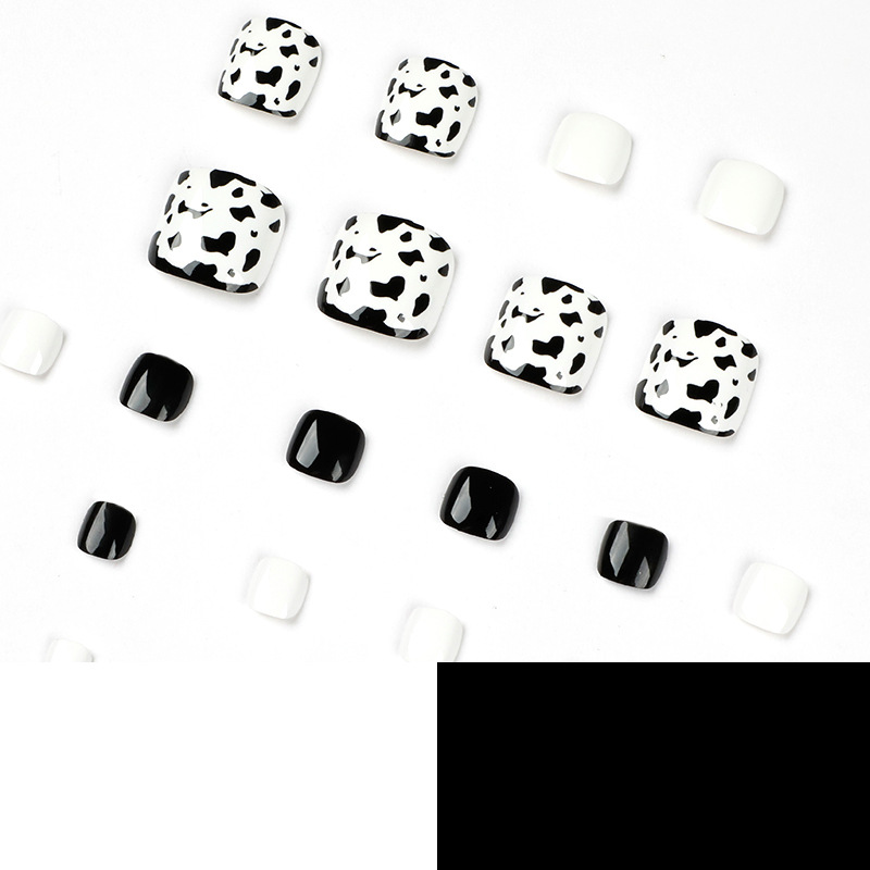 Black White Cow Toe Nails